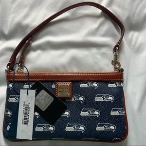 Dooney & Bourke NFL Seahawks Large Slim Wrislet NEW Never Been use.